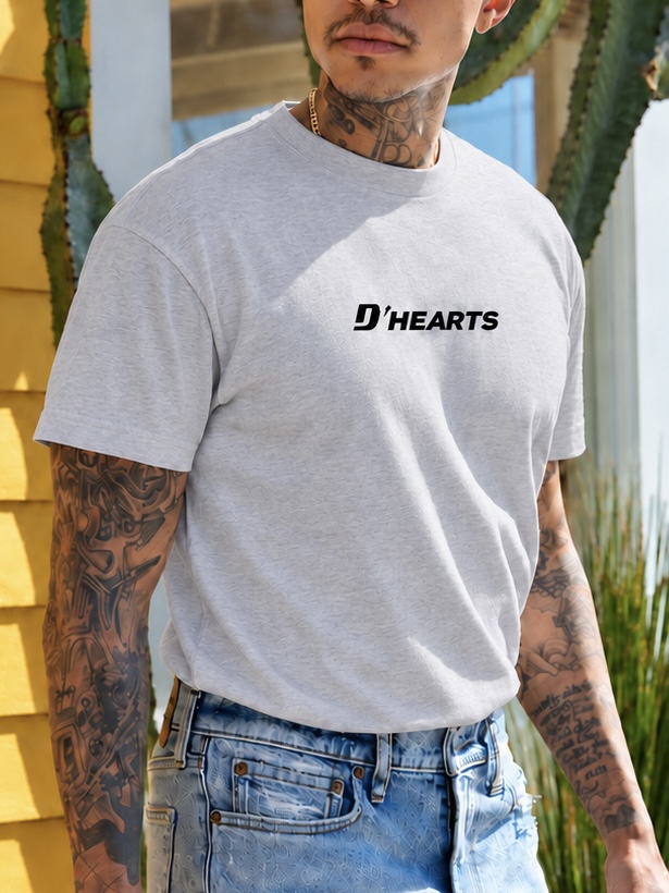 Man wearing a heather grey D'HEARTS unisex tee
